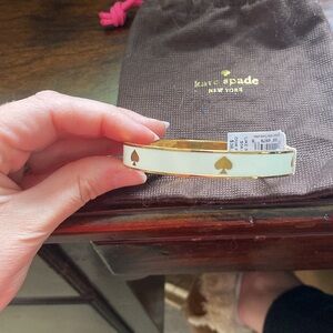 NWT cream and gold Kate Spade bangle